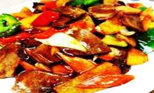 Говяжий язык с овощами в соусе